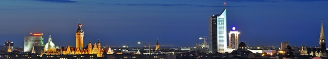 Leipziger Skyline bei Nacht genugate-case-studies-arvato-systems-01-min.jpeg